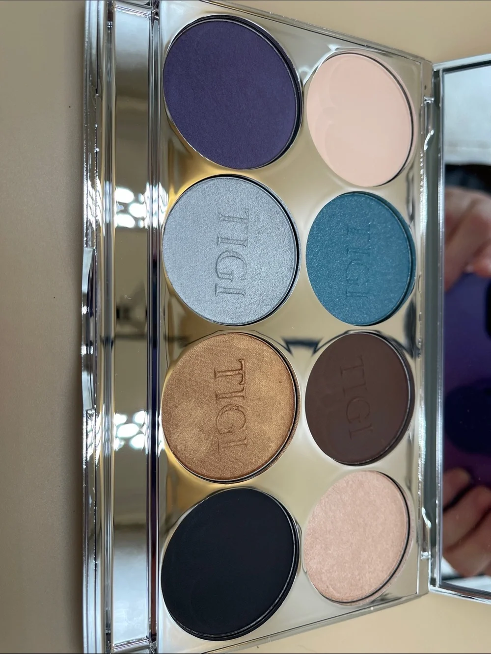 TIGI Logo Eye Shadow Palette with a mirror in the palette for on the go